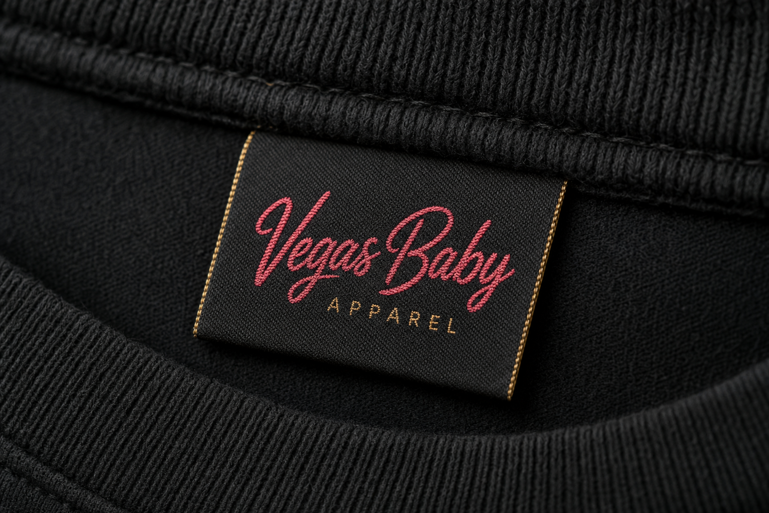 Vegas Baby Apparel embroidered label on black shirt